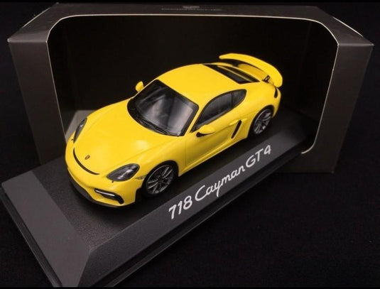 Porscheポルシェディーラーモデル 718 Cayman GT4 type 982 2019 speed yellow 1/43 Minichamps