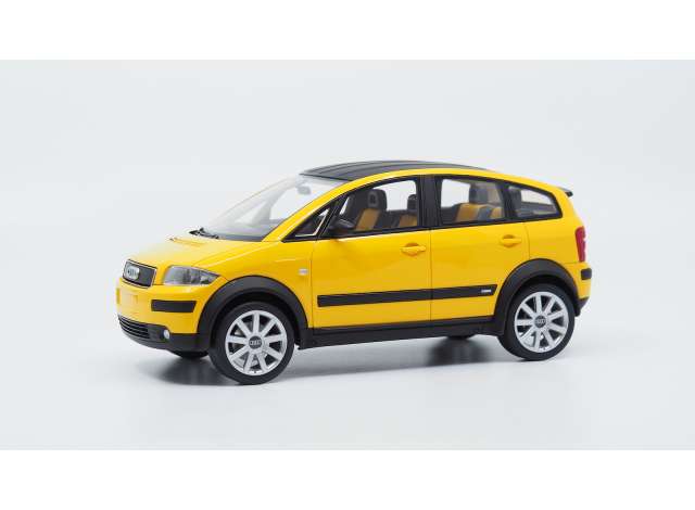 2003 Audi A2 Color Storm, yellow/DNA COLLECTIBLES 1/18ミニカー