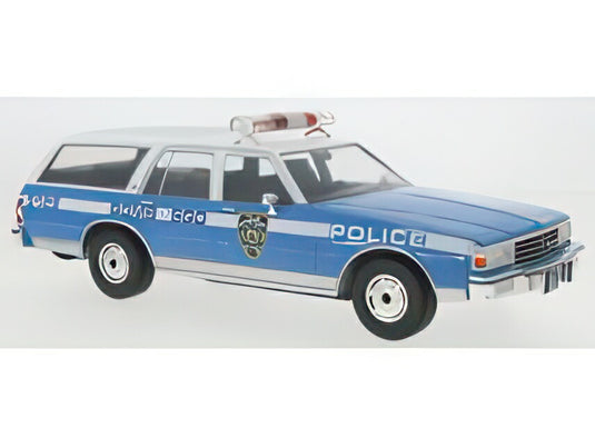 【予約】2026年発売予定CHEVROLET カプリス エステートワゴン NYPD ニューヨーク市警 1985 ブルー ホワイト/ MCG 1/18 ミニカー