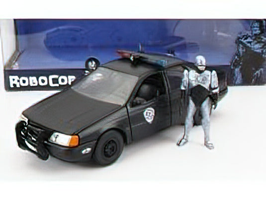 FORD USA - TAURUS LX DETROIT POLICE 1986 WITH ROBOCOP FIGURE - BLACK /JADA 1/24 ミニカー