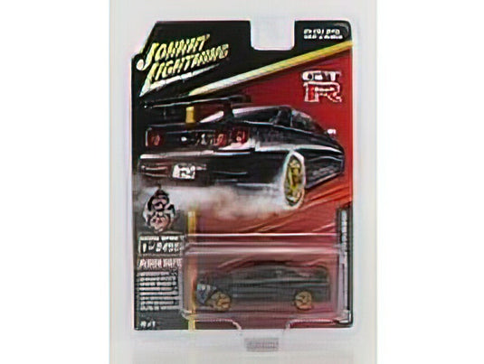 NISSAN - SKYLINEスカイライン GT-R (BNR34) 1999 - BLACK GOLD /JOHNNY LIGHTNING 1/64 ミニカー