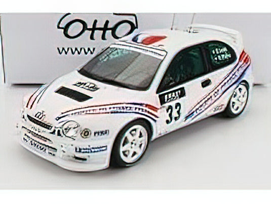 TOYOTA - COROLLA WRC N 33 RALLY TOUR DE COURSE 2000 S.LOEB - D.ELENA - WHITE/OTTO 1/18 ミニカー